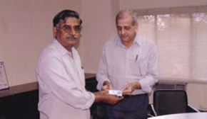 Chellappan receiving the award